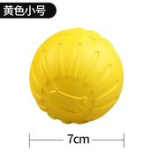 Yellow rubber Dog Molar Chew Toy Durable Ball with a measurement label on a white background