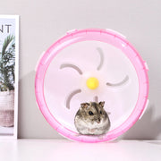 pink Hamster Exercise Wheel with a yellow center against a light gray background
