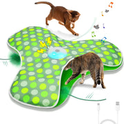 Hide and Seek Interactive Cat Toy Blanket with green and white polka dot design, featuring a USB cable and small green object, with cats interacting.
