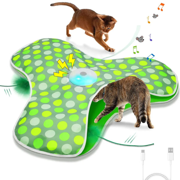 Hide and Seek Interactive Cat Toy Blanket with green and white polka dot design, featuring a USB cable and small green object, with cats interacting.