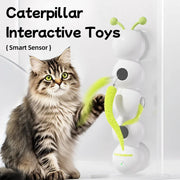 Cat playing with a Caterpillar Interactive Cat Toy with a smart sensor, featuring a cat and toy on a white background.