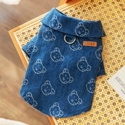 Blue Cute Pet Overalls Dress Denim and Plaid Style with bear pattern on a textured surface