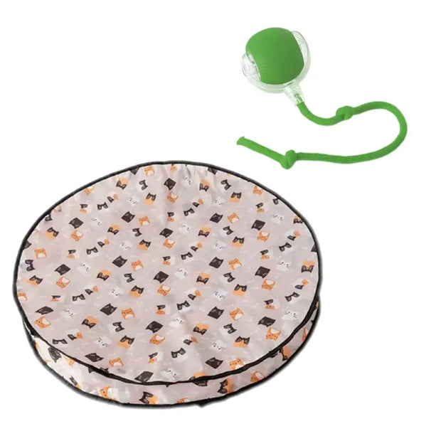 Round Interactive Cat Toy with Smart Obstacle Avoidance mat with Halloween-themed design and a green leash on a white background