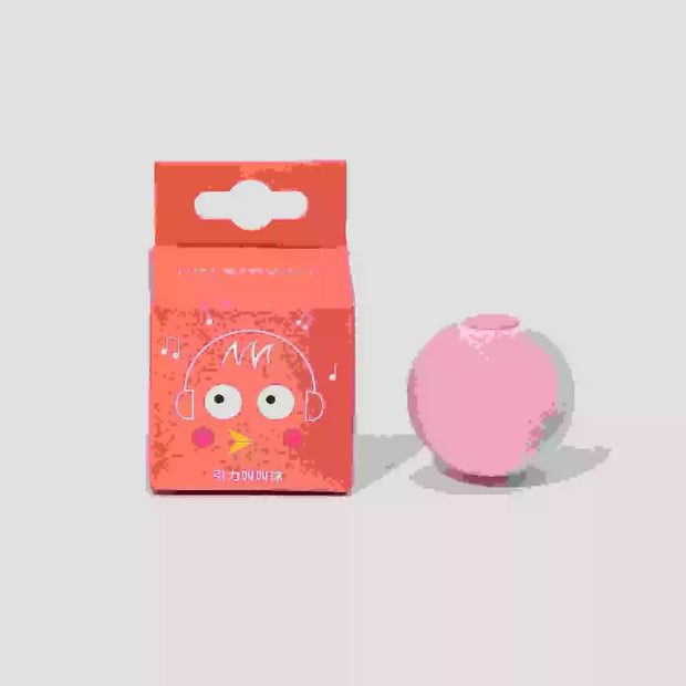Pink spherical Interactive Cat Toy with Smart Obstacle Avoidance object next to its packaging on a light gray background