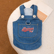 Blue Cute Pet Overalls Dress Denim and Plaid Style with 'Retired Joy' text on a textured surface