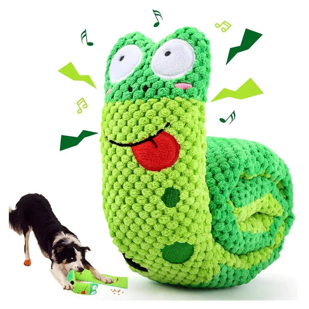 Green crocheted Plush Frog Dog Toy with a dog playing with it on a white background