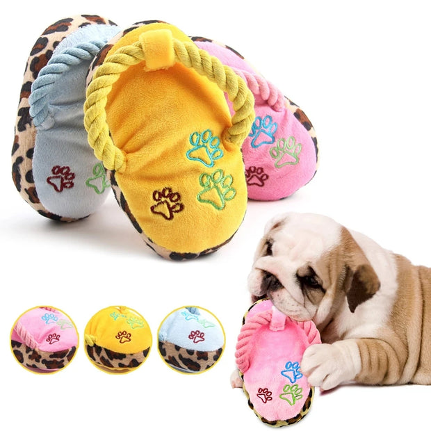 Plush Slipper Dog Toy with paw designs in various colors and a dog playing with a pink toy.