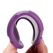 Purple and white Durable Dog Frisbee Toy held by a hand on a white background