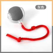 Gray Intelligent Interactive Cat Toy Ball with a red cord on a white background