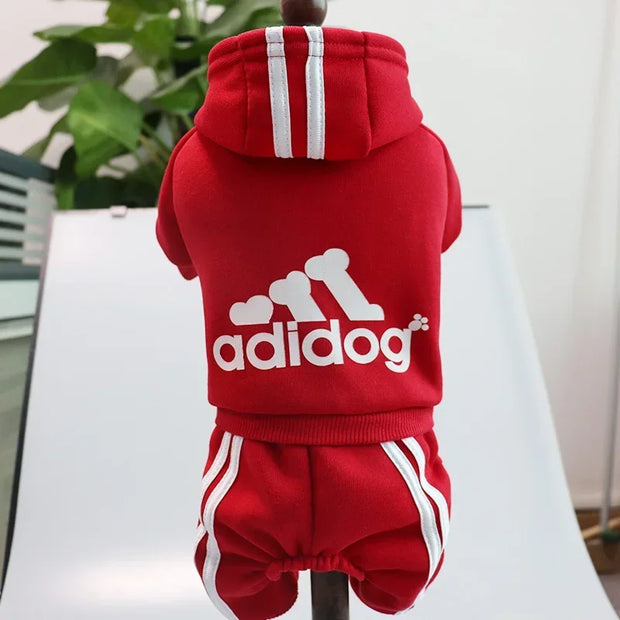 Red pet Adidog Hoodie with 'adidog' logo on a white surface