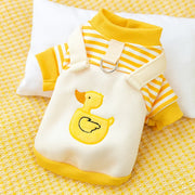 Yellow and white striped Duck Overalls Pet Outfit on a yellow textured surface