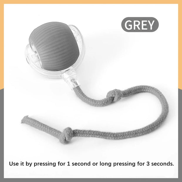 Gray handheld Automatic Obstacle Avoidance Pet Toy Ball with a rope, labeled 'GREY', on a white background.