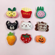 Soft Plush Pet Sports Balls Toy Set shaped like fruits, vegetables, and animals on a light pink background