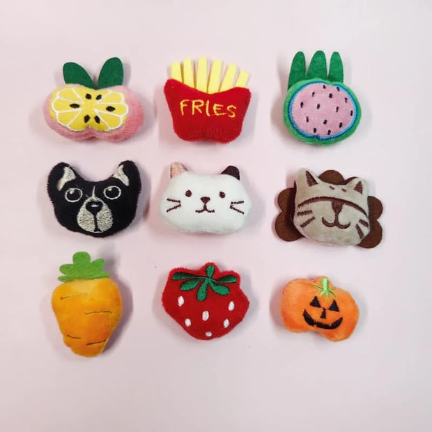 Soft Plush Pet Sports Balls Toy Set shaped like fruits, vegetables, and animals on a light pink background