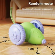 Green Smart Interactive Cat Toy mouse with wheels on a wooden floor, simulating a real mouse escape route.