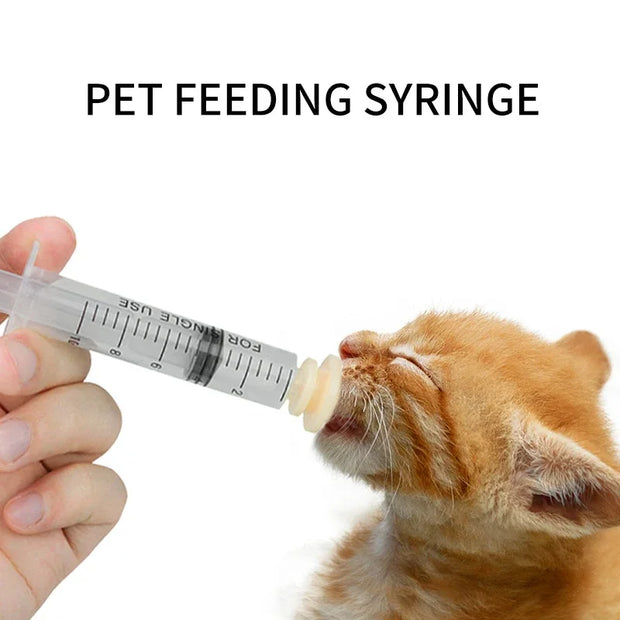 Silicone Syringe Adapter Head Replacement Accessory -10ml pet feeding syringe being used to feed a kitten, designed for newborn pets and small animals.