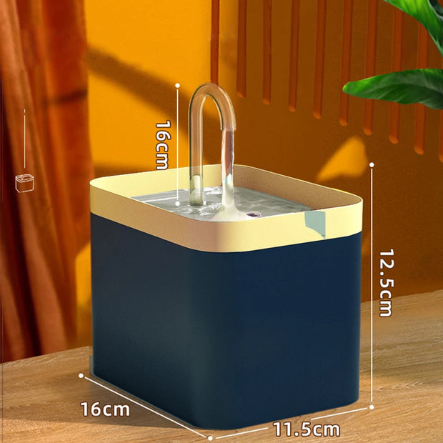 Blue and gold rectangular Modern Pet Water Fountain with dimensions on a wooden surface and orange wall background