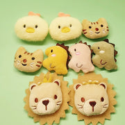 Soft Plush Pet Sports Balls Toy Set on a green background