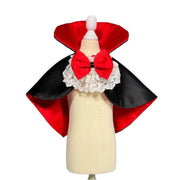 Mannequin wearing a red and black Vampire Pet Costume with a white bow on a white background