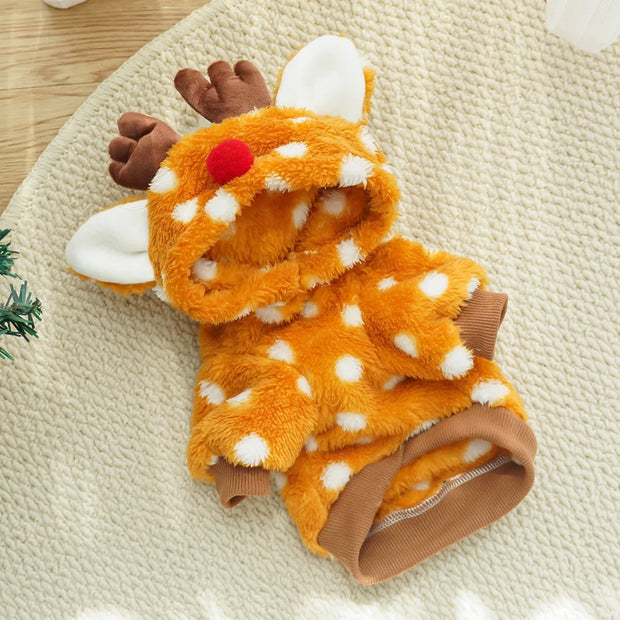 Christmas Reindeer Pet Costume shaped like a reindeer on a textured surface