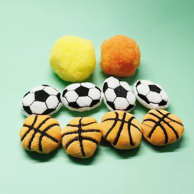 Soft Plush Pet Sports Balls Toy Set including soccer, basketball, and rugby on a light green background