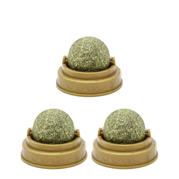 Three green Catnip Ball Toy in beige holders with '3PCS' text above on a white background