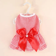 Red Summer Princess Dress with a large bow on a beige background
