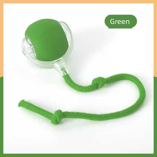 Green silicone Interactive Cat Toy with Smart Obstacle Avoidance with a rope on a white background