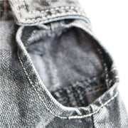 Close-up of a gray Cool Dog Jeans Jacket with stitching detail