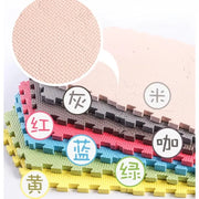 Colorful Pet Training Button foam mats with labels indicating colors on a white background