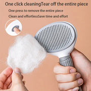 Gray Pet Grooming Brush with One Click Hair Removal being used to release trapped fur