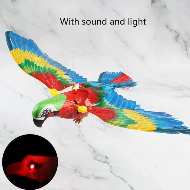 Colorful Electric Flying Bird Cat Toy with sound and light feature on a marble background