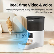 ROJECO Automatic Cat Feeder with Camera and Voice Recorder placed on a kitchen counter, displaying feeding schedule setup on a smartphone.