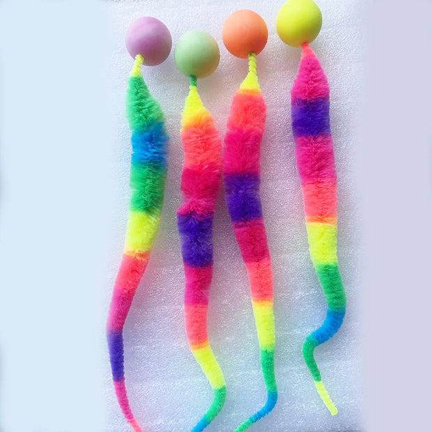Four Colorful Rainbow Tail Cat Toy Balls on a white background