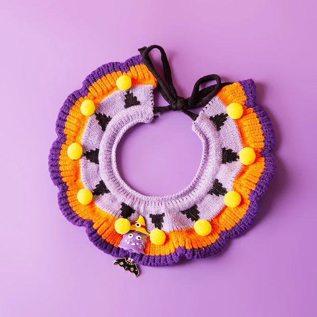 Halloween Knitted Collar Pet knitted wreath with pom-poms on a purple background
