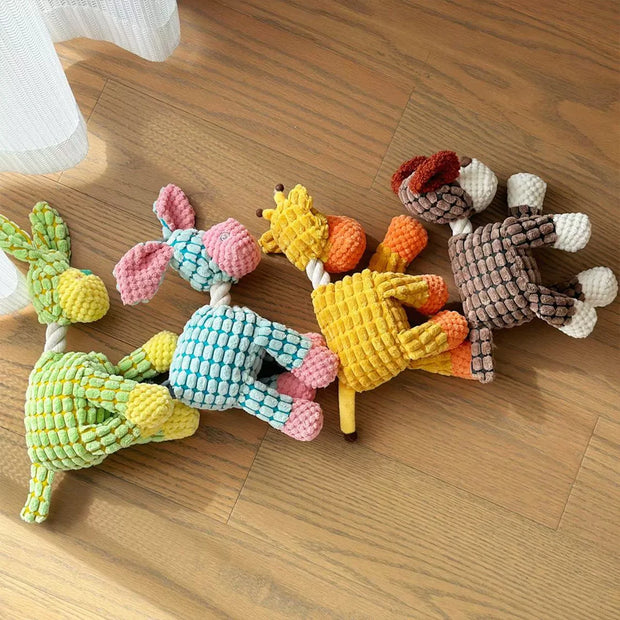 Colorful Plush Animal Rope Dog Toys on a wooden floor