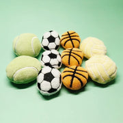 Collection of various Soft Plush Pet Sports Balls Toy Set on a light green background