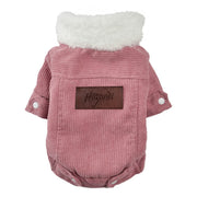 Pink Corduroy Dog coat with white fur lining on a white background