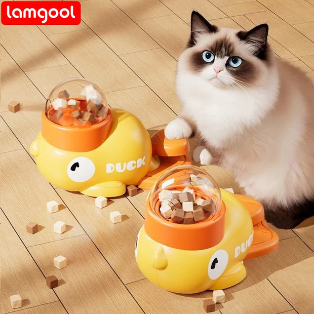 Cat playing with a Interactive Treat Dispenser Toy for Dogs on a wooden floor, with 'lamgool' brand visible.