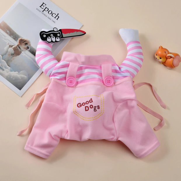 Pink pet outfit with Cute Halloween Costume leaves on a beige surface, featuring the text 'Good Dogs'.