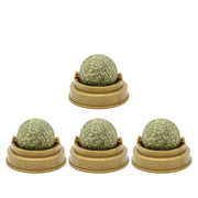 Four green Catnip Ball Toy in beige holders with '4PCS' text above on a white background