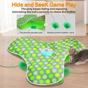 Hide and Seek Interactive Cat Toy Blanket with green polka dots and a cat playing with it on a wooden floor.