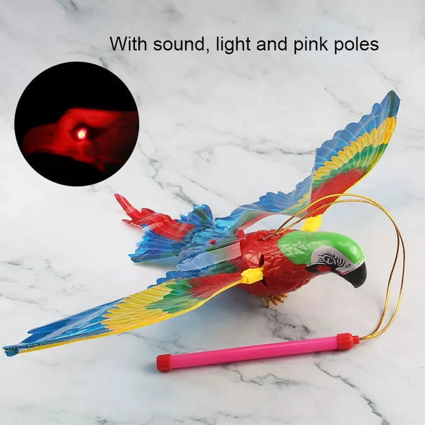 Colorful Electric Flying Bird Cat Toy with sound, light, and pink poles on a marble background