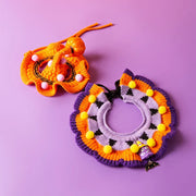 Two Pet Halloween Knitted Collar on a purple background