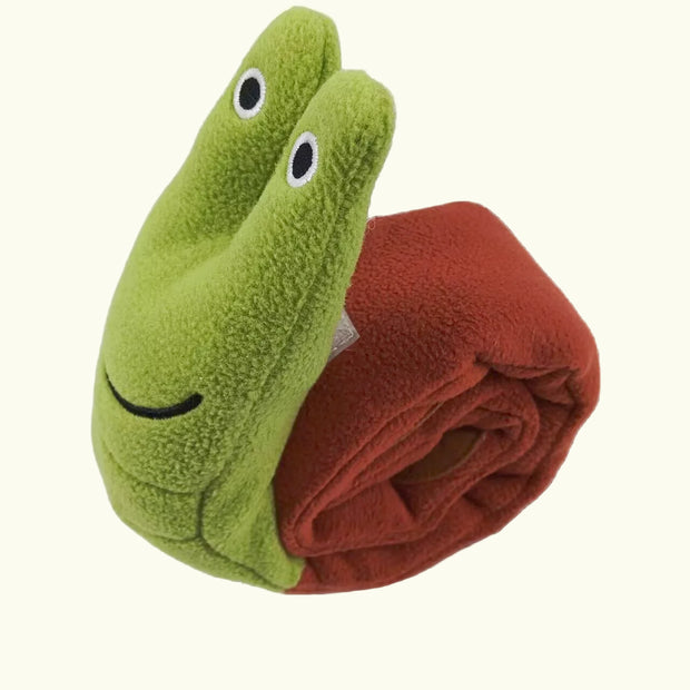 Green Plush Frog Dog Toy with a face and a red blanket on a white background