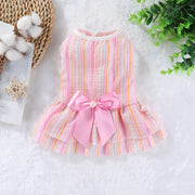 Pink and multicolored striped Summer Princess Dress with a bow on a white background