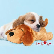Puppy sleeping on a Heartbeat Plush Dog Toy with a blue background