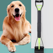 Happy Golden Retriever next to a black and green Easy Grip Dog Pooper Scooper grooming tool on a teal background