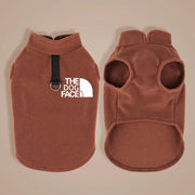 Brown Fleece Dog Jacket with 'The Dog Face' logo on a beige background