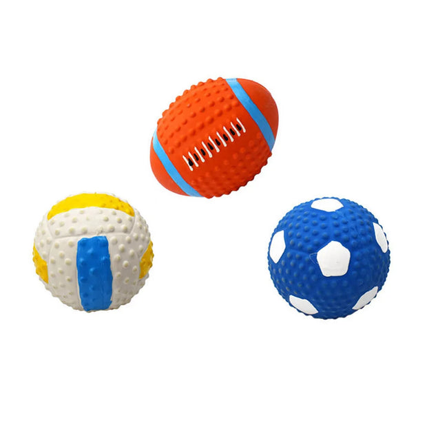 Three textured rubber Durable Dog Sports Balls in orange, yellow, and blue on a white background